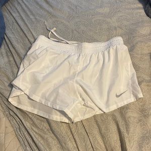 White Nike shorts